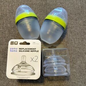 Como Tomo bottles with replacement nipples
